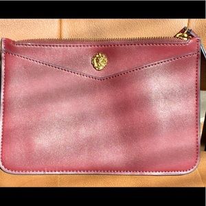 Burgundy Clutch never used dents due to storage